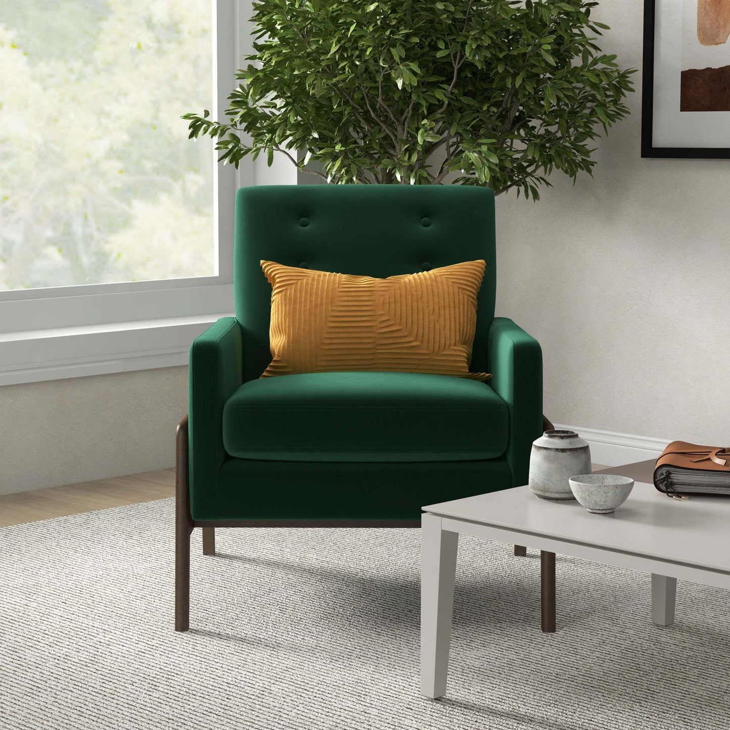 Modern green armchair with gold pillow in cozy living room, beside coffee table and indoor plant