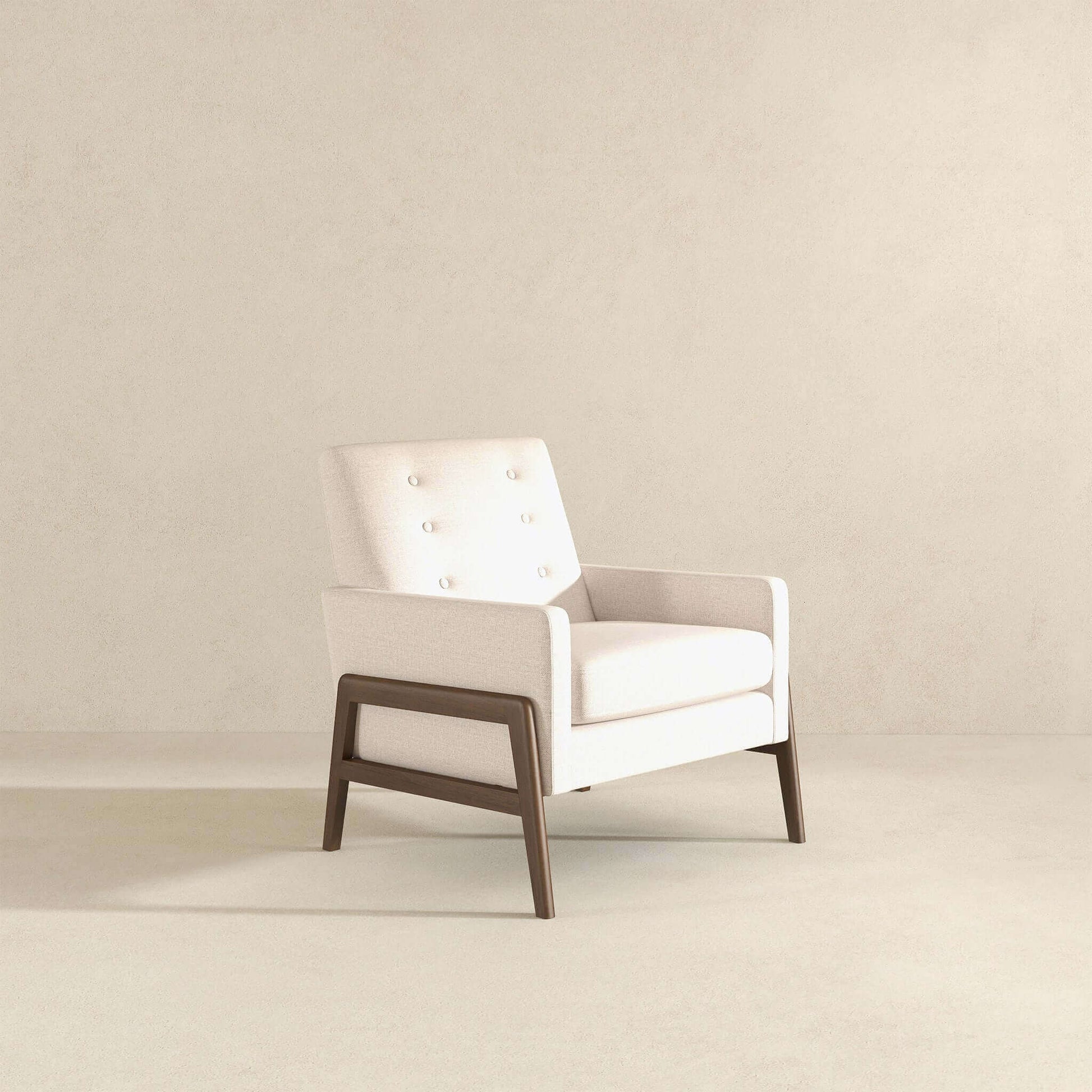 Modern cream armchair with wooden frame in minimalist room, FredCo International furniture