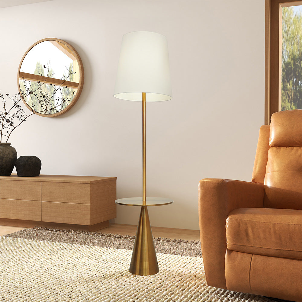 Modern living room with gold floor lamp, leather sofa, wood cabinet, and round mirror