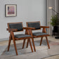 Pair of modern wooden armchairs with black cushions in stylish living room setting