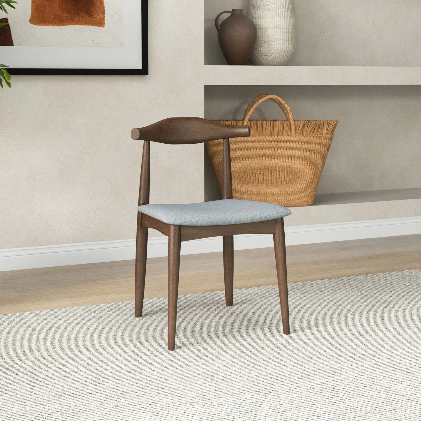 Modern wooden dining chair with light gray cushion in contemporary home setting