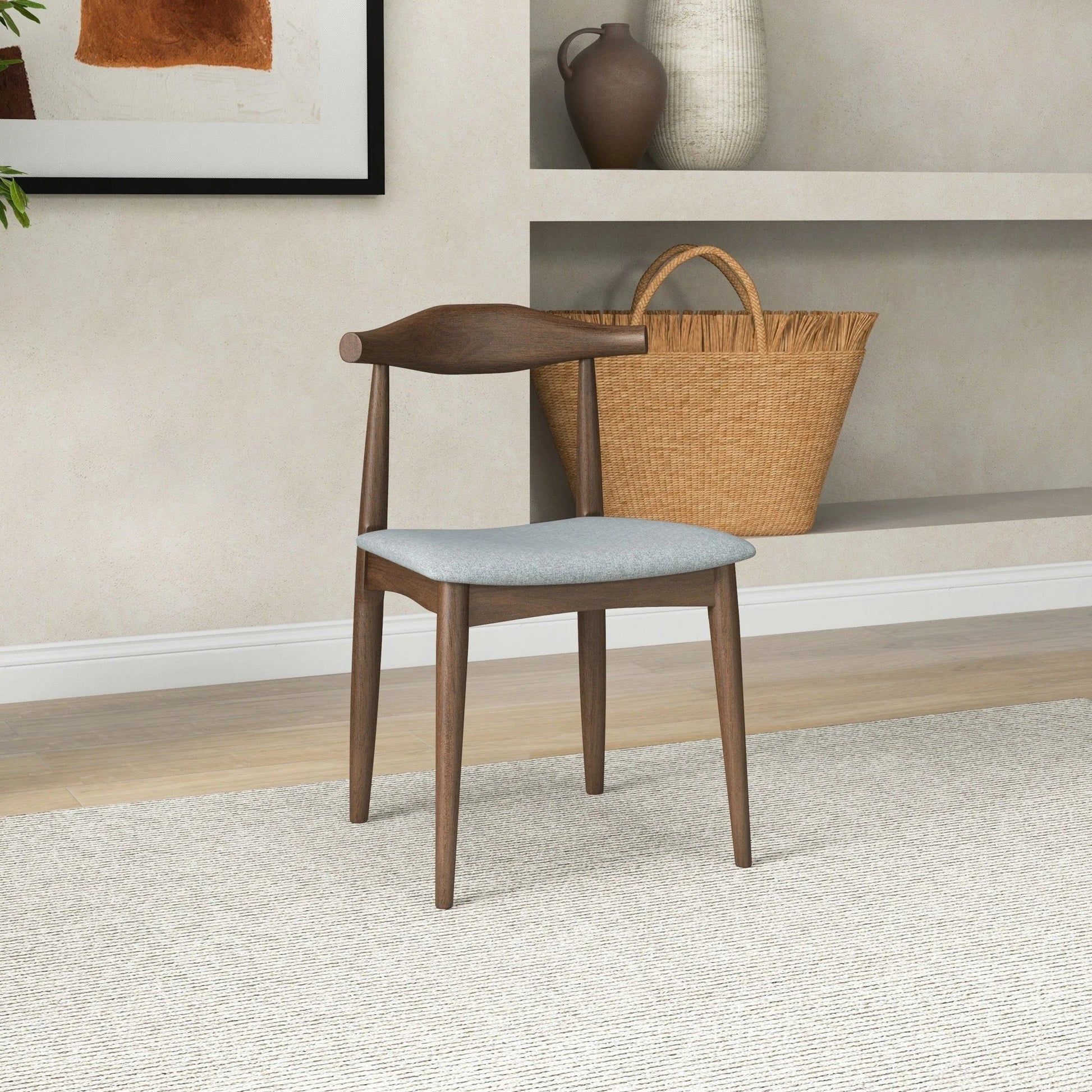 Modern wooden dining chair with light gray cushion in contemporary home setting