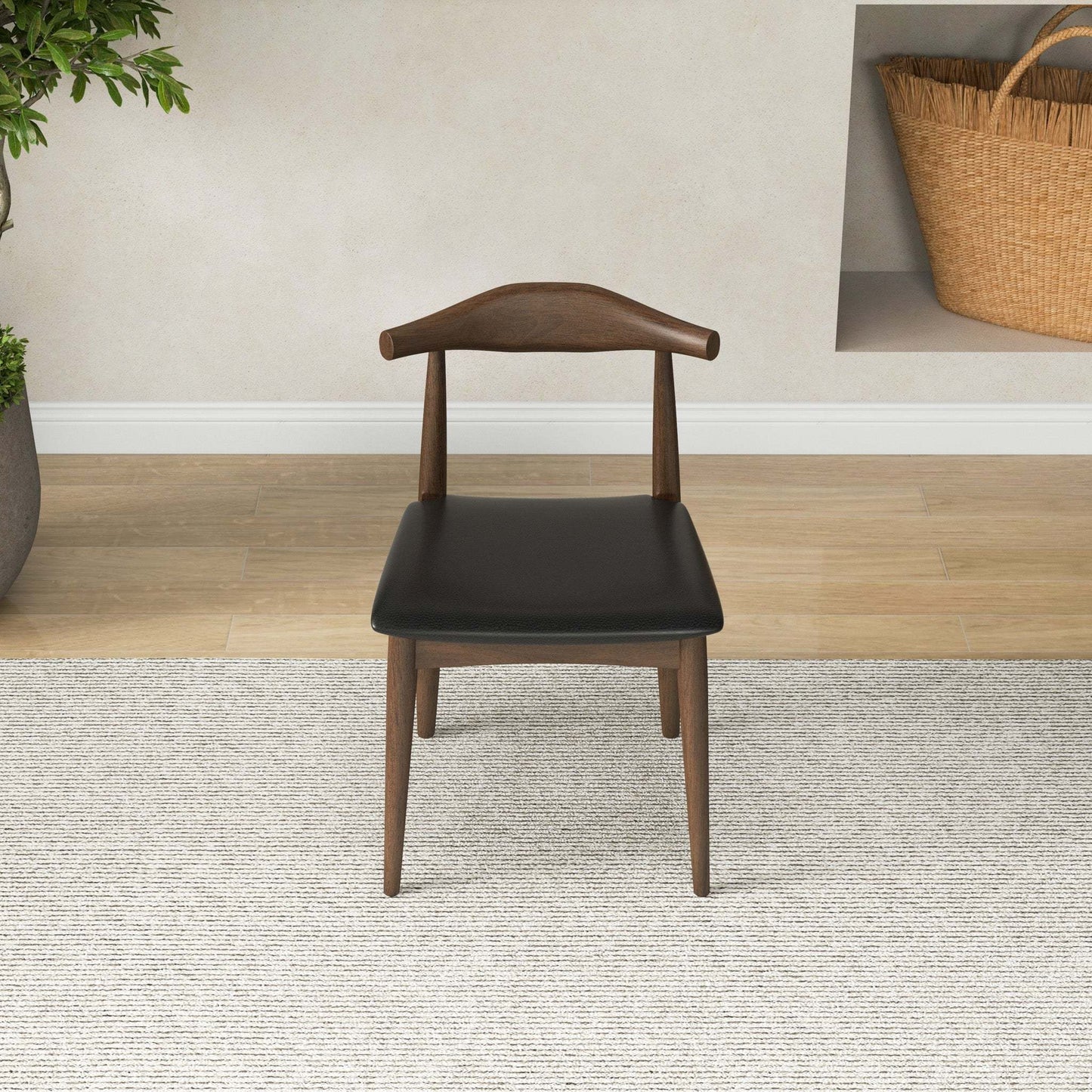 Modern wooden dining chair with black seat cushion on light rug, FredCo International furniture