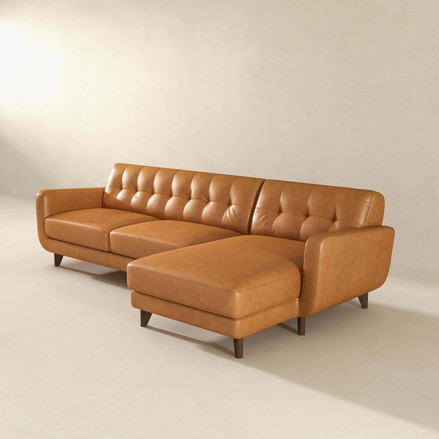 Mid-century modern tan leather sectional sofa with tufted back from FredCo International
