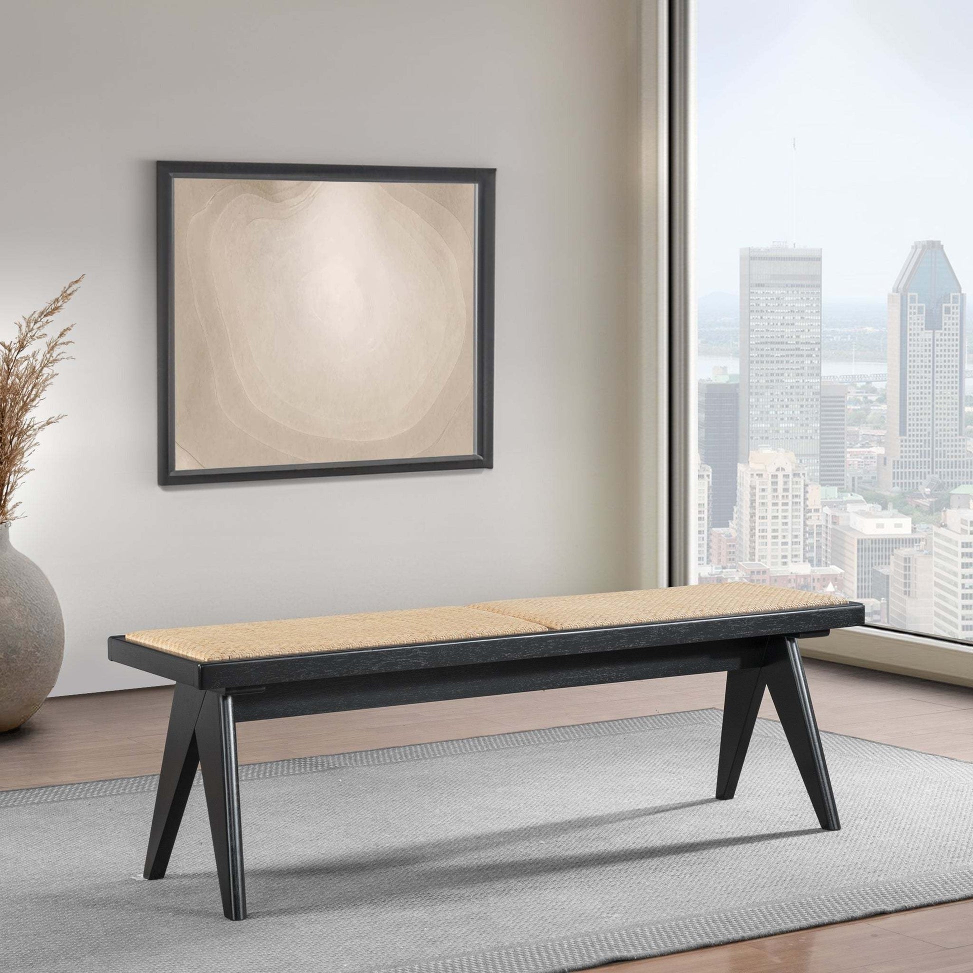 Modern wood bench with woven seat in bright apartment, city view, neutral decor, FredCo International furniture