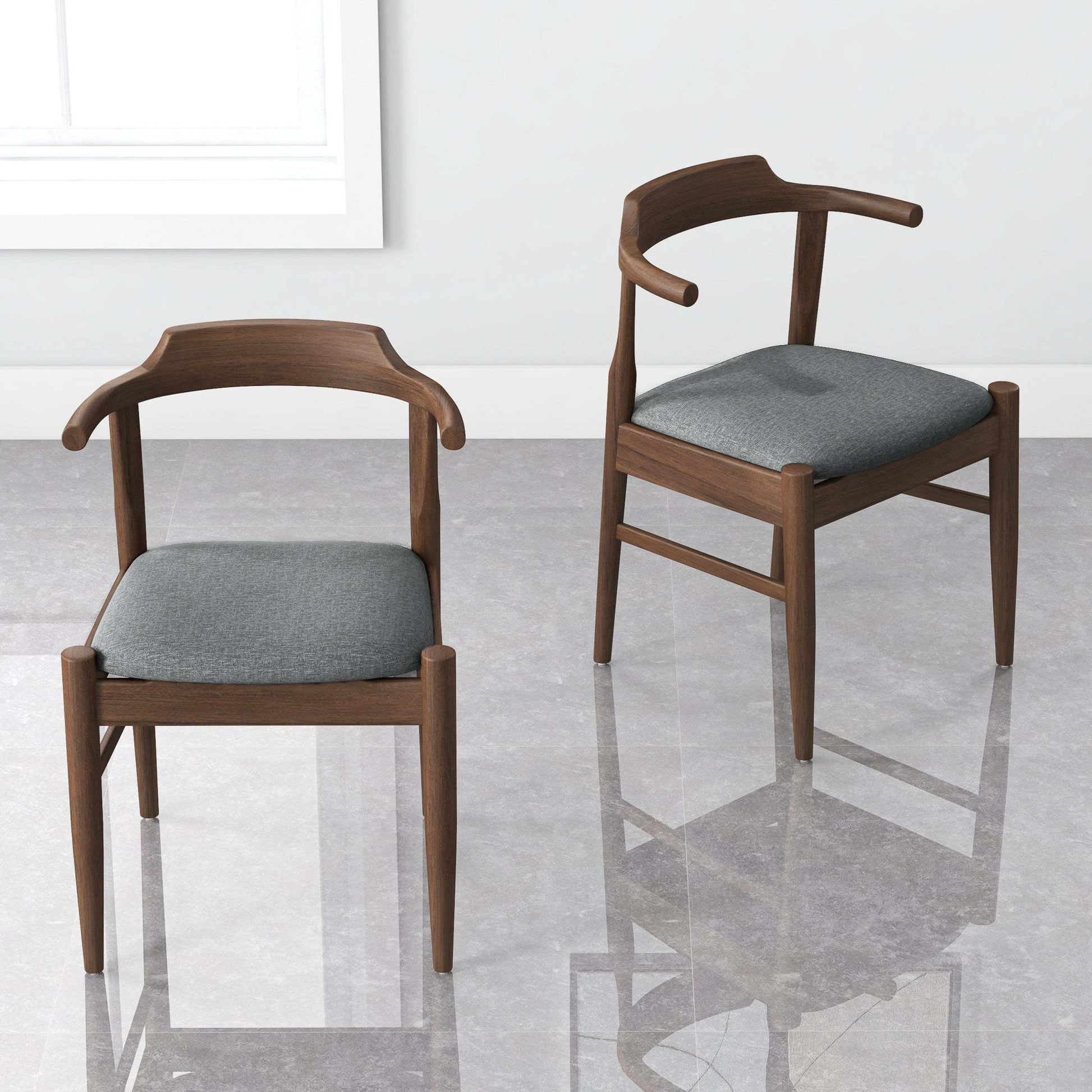 Modern wooden dining chairs with gray cushions on a glossy floor, FredCo International furniture