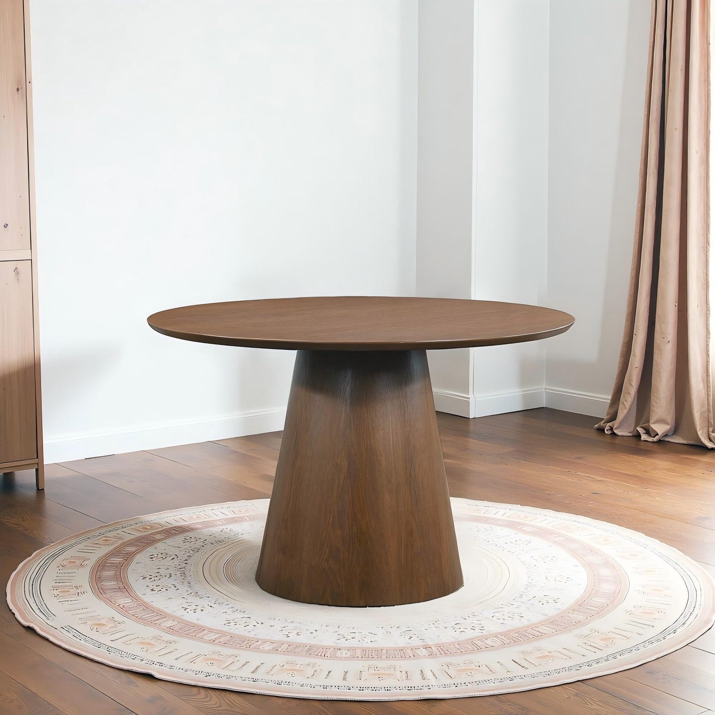 Modern round wooden dining table on patterned rug in bright living room, FredCo International