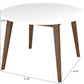 Modern round dining table with white top, wood legs, and dimensions 43.3x29.5 inches