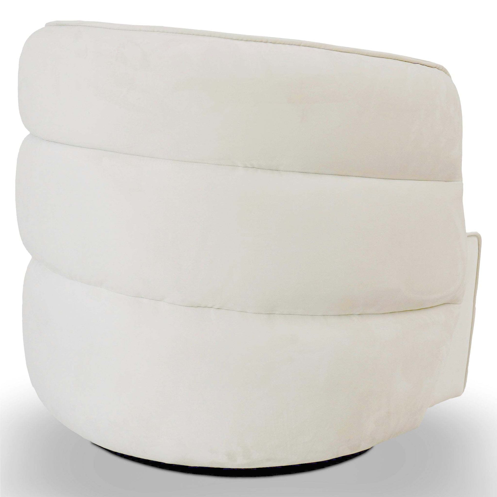 Modern white accent chair with plush, rounded cushions from FredCo International furniture