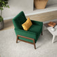 Modern green accent chair with yellow cushion in stylish living room, FredCo International furniture