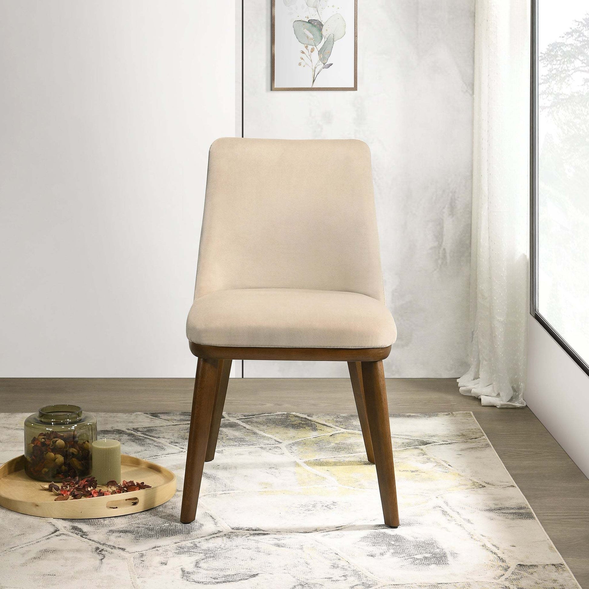 Modern beige upholstered accent chair with wooden legs in bright living room setting