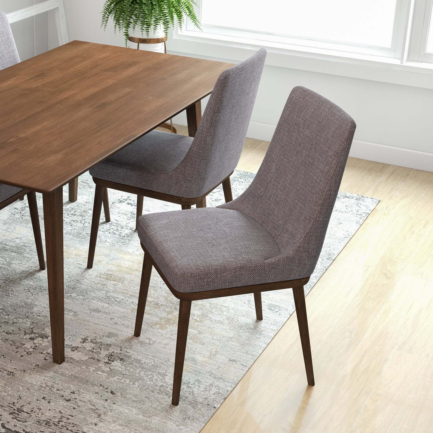 Modern dining room with gray upholstered chairs and wooden table, FredCo International furniture