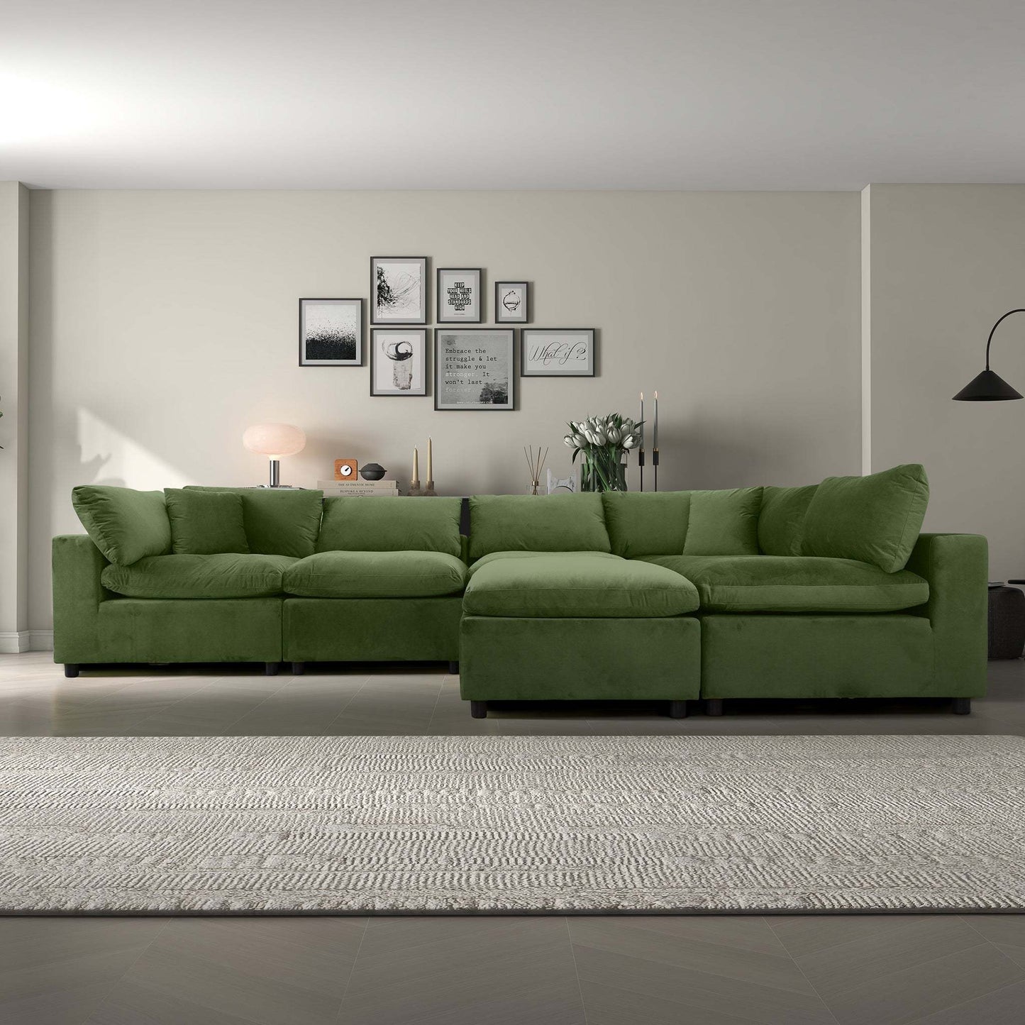 Modern living room with green sectional sofa, wall art, and FredCo International furniture decor