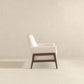 Modern beige accent chair with wooden frame, minimalist furniture for living room