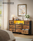 SONGMICS Dresser for Bedroom with Outlets & LED Lights, 8 Fabric Drawers – Rustic Brown, Ink Black