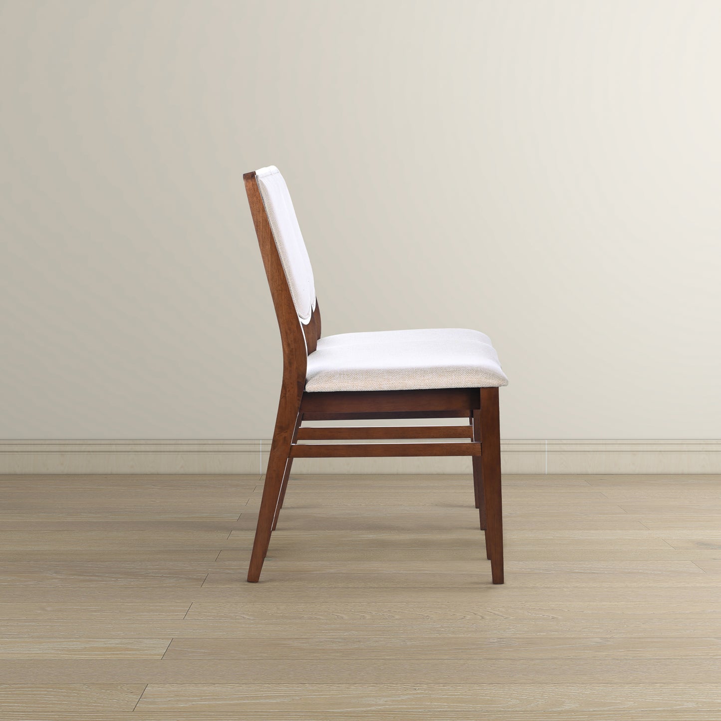 Wooden dining chair with white cushion on hardwood floor, FredCo International furniture