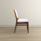 Wooden dining chair with white cushion on hardwood floor, FredCo International furniture