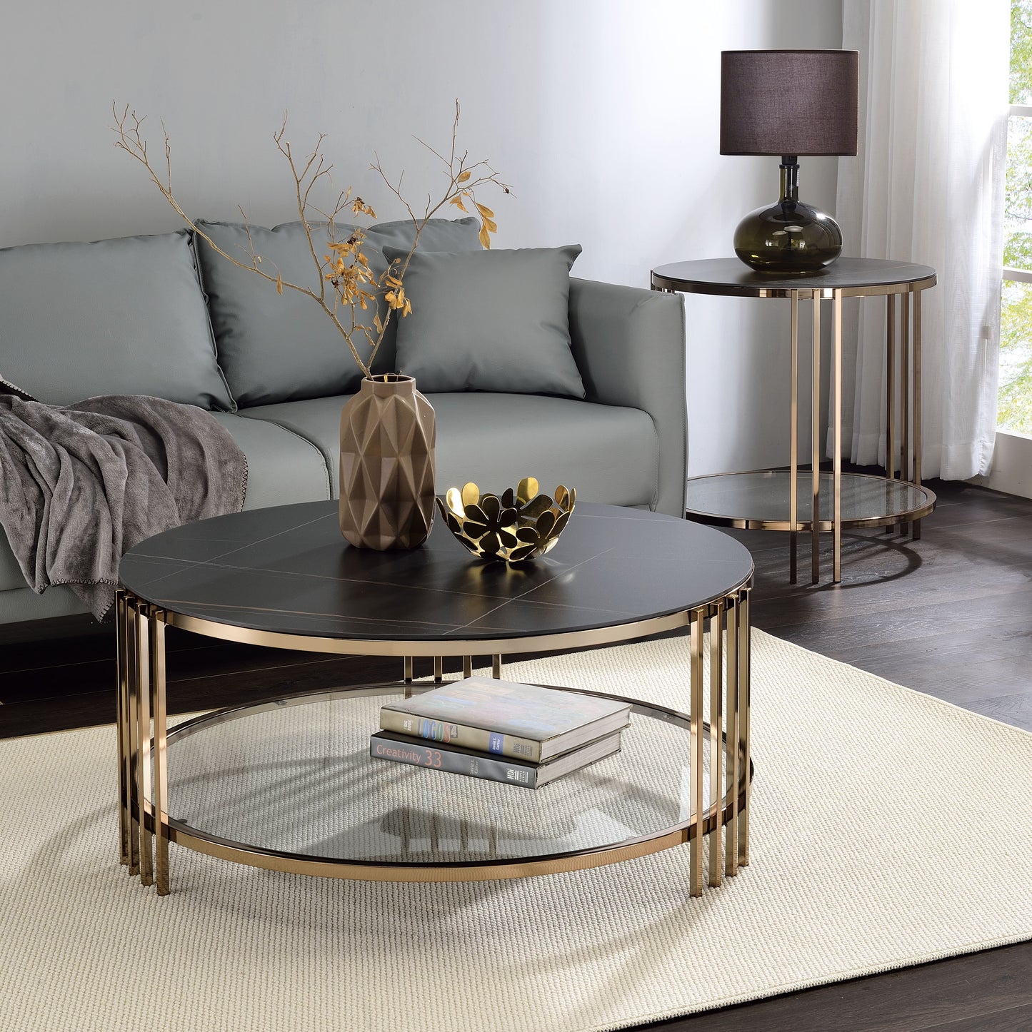 Abisha Sintered Stone Top & Champagne Finish Round Coffee Table FredCo