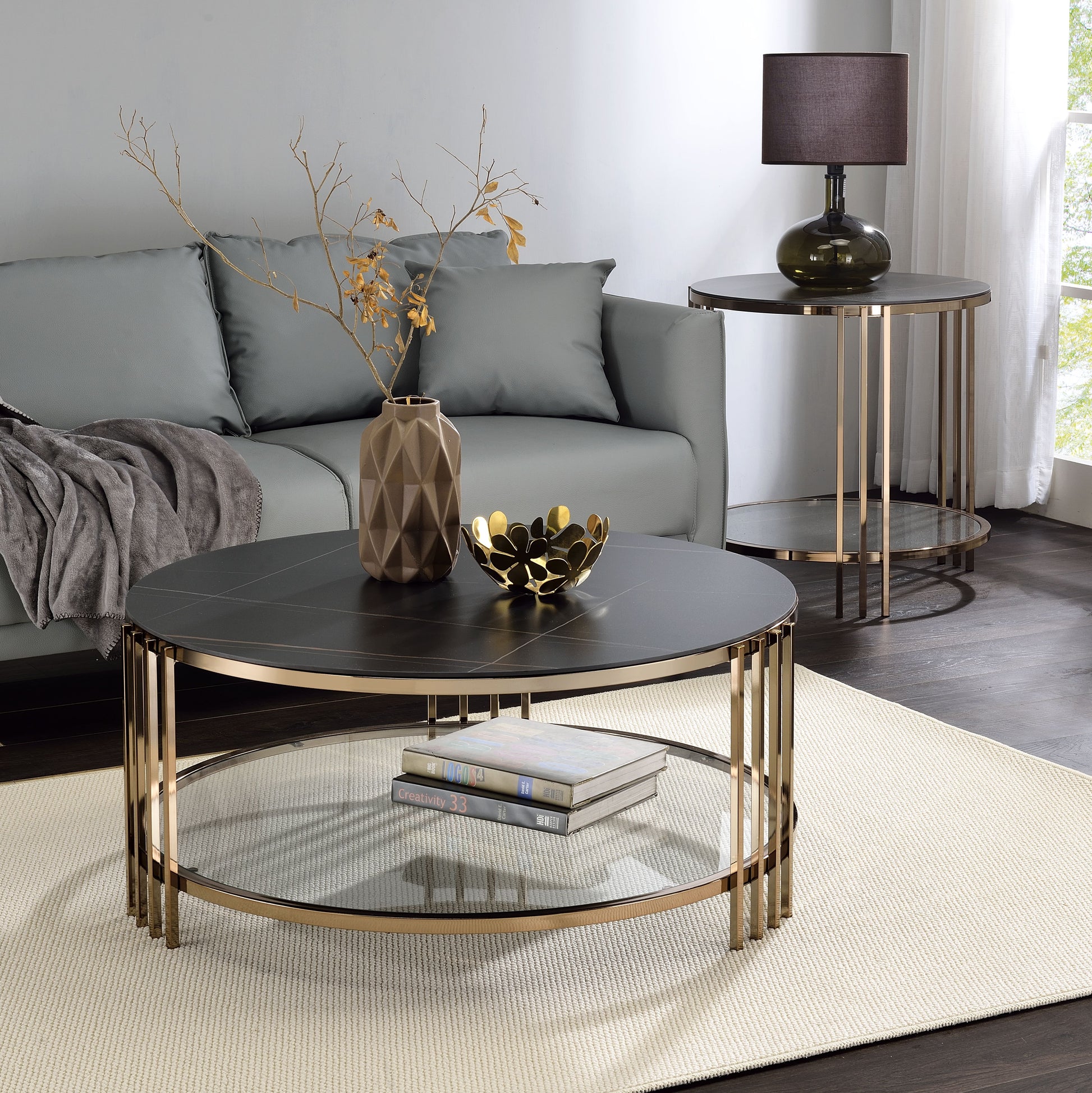 Abisha Sintered Stone Top & Champagne Finish Round Coffee Table FredCo
