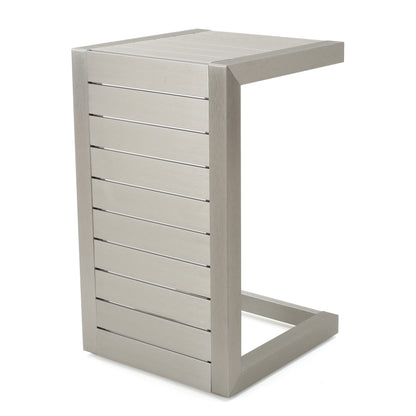 Modern silver metal C-shaped side table with slatted design, FredCo International furniture