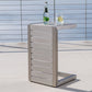 Modern patio side table with metal slats, glass of water and bottle, outdoor setting