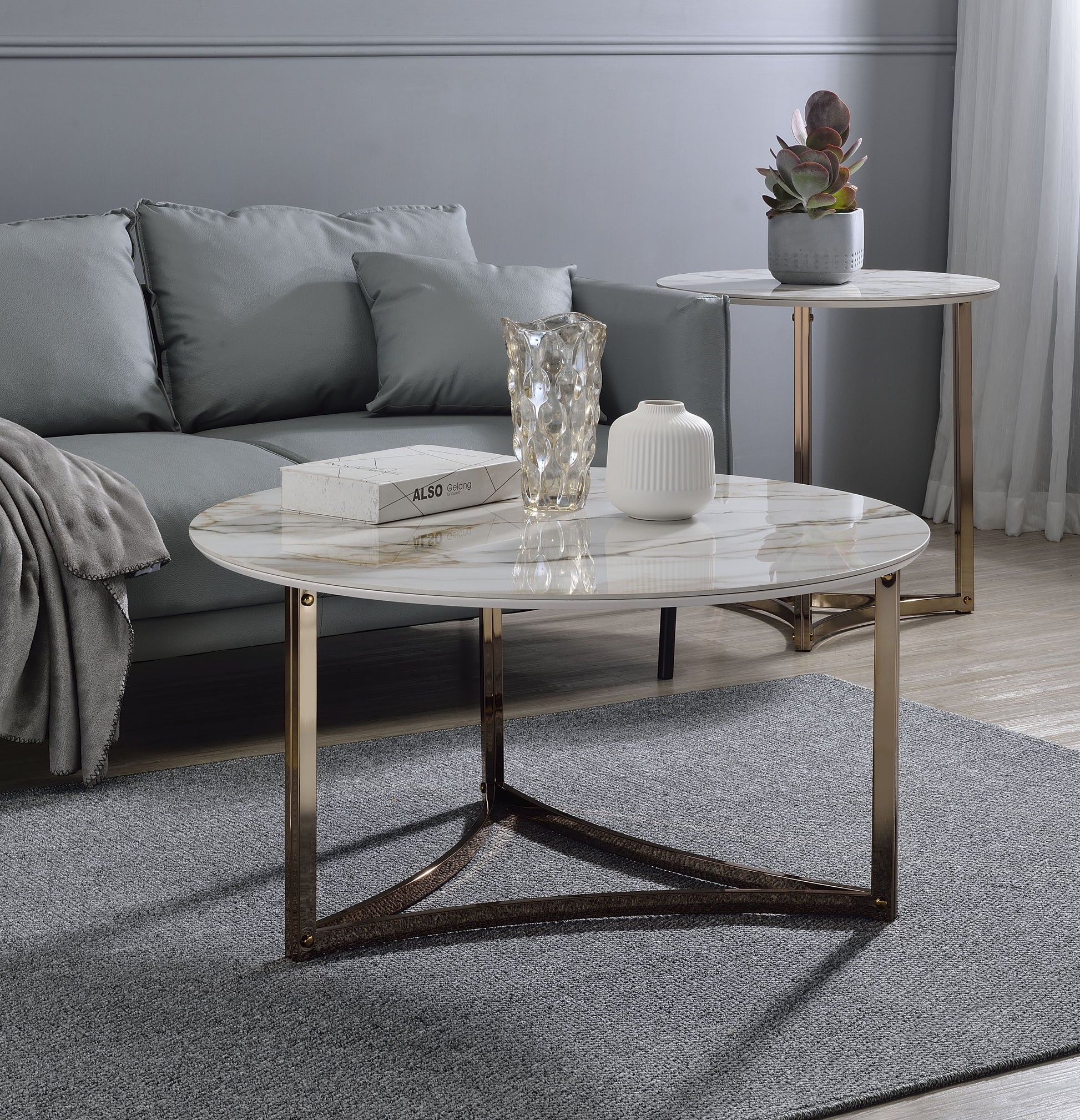 Aziz Sintered Stone Top & Champagne Finish Round Coffee Table FredCo