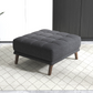 Modern dark gray tufted ottoman on geometric rug, FredCo International furniture
