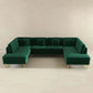 Modern green velvet U-shaped sectional sofa with tufted back and gold legs in minimal room