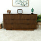 Modern wooden dresser with decor clock, elephant figurine, and green Buddha head on top.