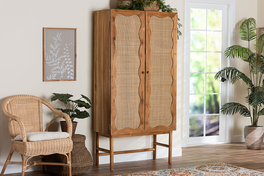 Natural rattan wooden cabinet and wicker chair in bright living room with plants and rug