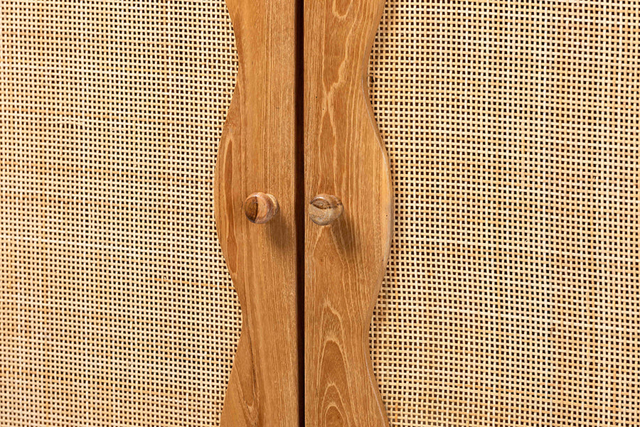 Close-up of wooden cabinet doors with woven rattan panels and stylish handles