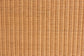 Natural rattan wicker texture, close-up, ideal for furniture and home decor at FredCo International