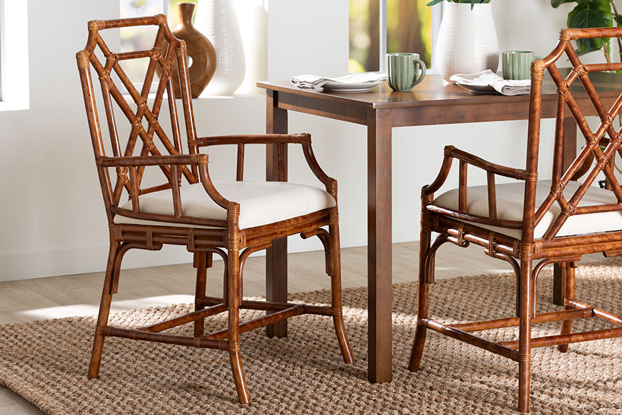 Rattan dining chairs with beige cushions and wooden table in a bright home setting