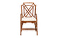Wooden armchair with a geometric lattice back and white cushion from FredCo International