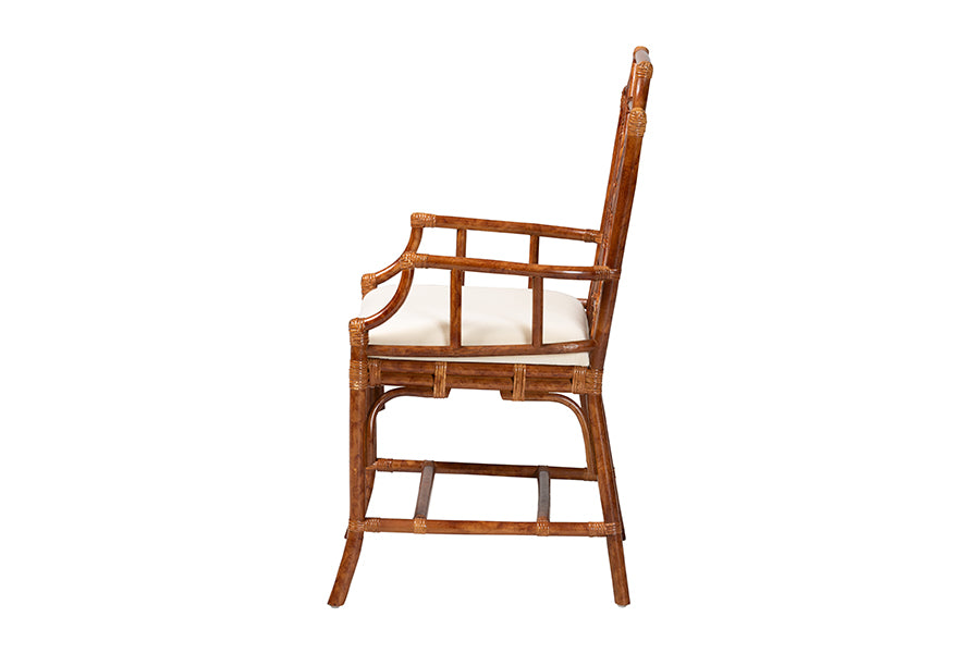 Side view of a wooden armchair with lattice design and white cushion, FredCo International furniture