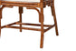 Close-up of bamboo wood chair legs with natural finish from FredCo International furniture