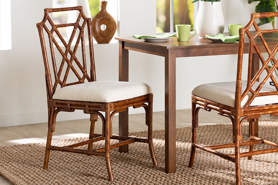 Rattan dining chairs with cream cushions at a wooden table in a modern dining room, FredCo International