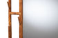 Close-up of rustic wood framed mirror with natural branch details, FredCo International furniture