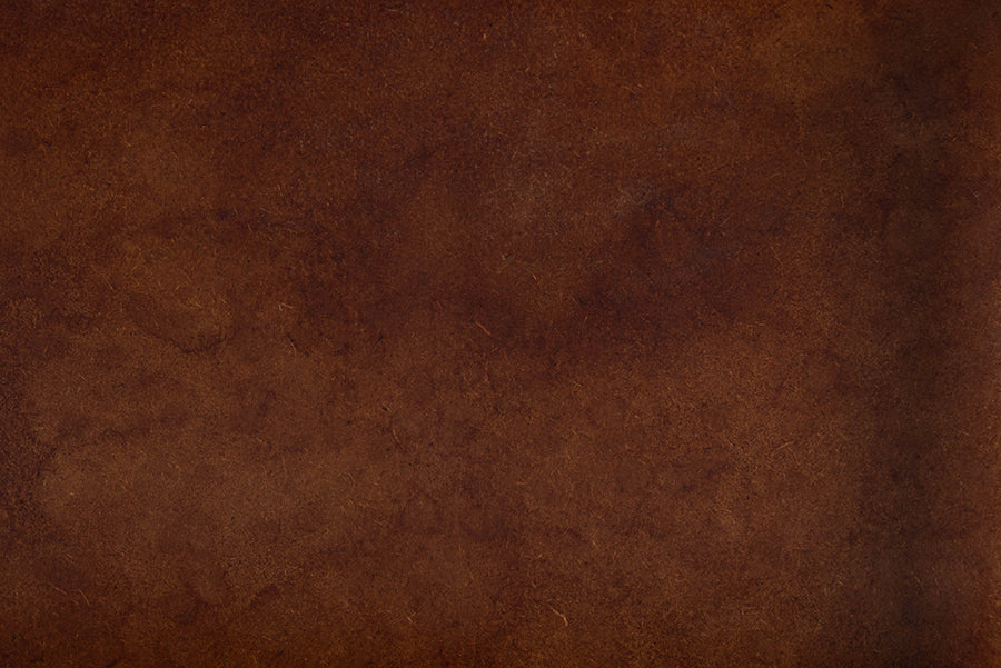 Brown leather texture sample for furniture upholstery at FredCo International