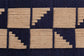 bali & pari Jerilyn Modern Bohemian Two-Tone Navy Blue and Natura Brown Seagrass and Acacia Wood Accent Bench FredCo