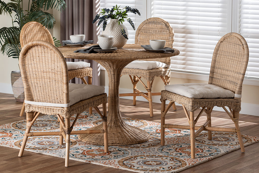 Rattan dining set with round table and four cushioned chairs in sunlit room, FredCo International