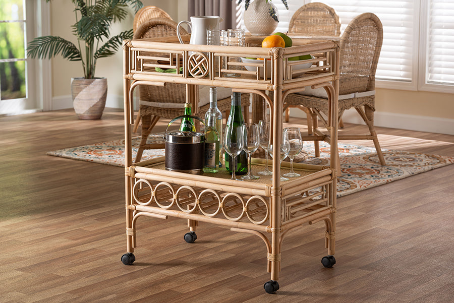 Rattan bar cart with glassware and bottles in bright dining room, FredCo International furniture