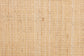 Close-up of natural rattan cane webbing, woven texture for home furniture decor.