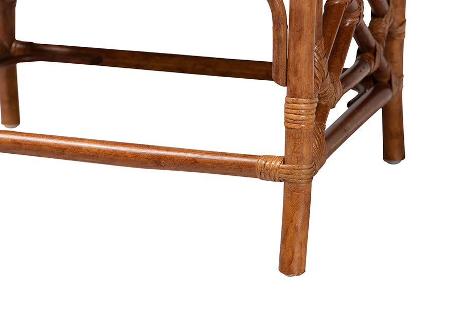 Close-up of rattan furniture leg and frame, natural wood detail from FredCo International