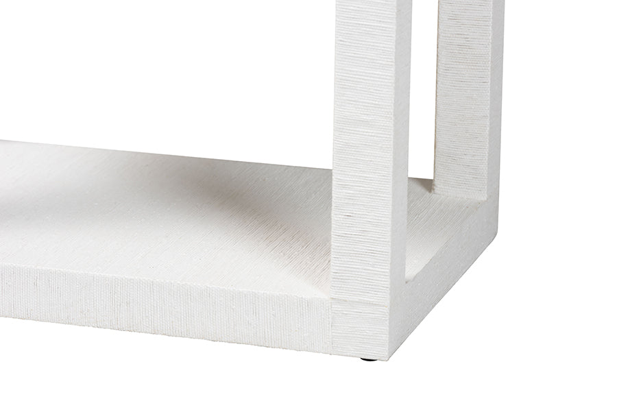 Close-up of white modern furniture leg with textured finish, FredCo International