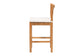 Side view of wooden dining chair with white cushion, FredCo International furniture