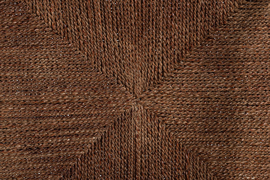 Close-up of woven brown seagrass furniture texture from FredCo International