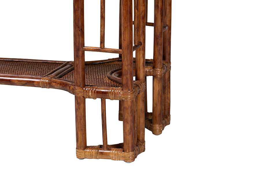 Close-up of a brown rattan furniture leg and woven shelf from FredCo International