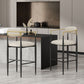 Modern beige upholstered bar stools with black and gold metal frames in a sleek kitchen setting