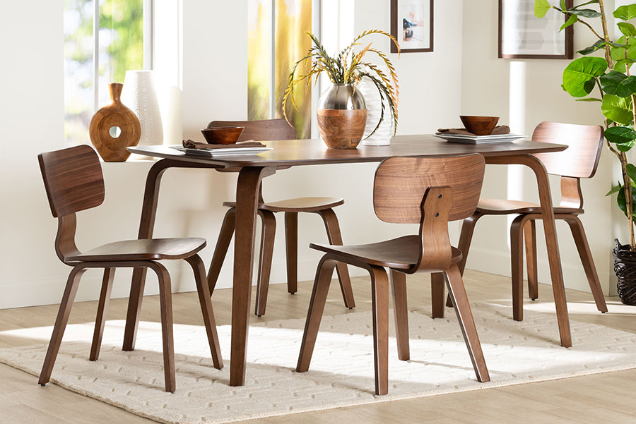 Modern wood dining table set with four chairs in bright room, FredCo International furniture